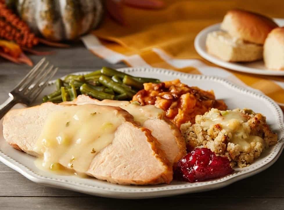St. John's United Church | Thanksgiving dinner with turkey, green beans and gravy on a plate.