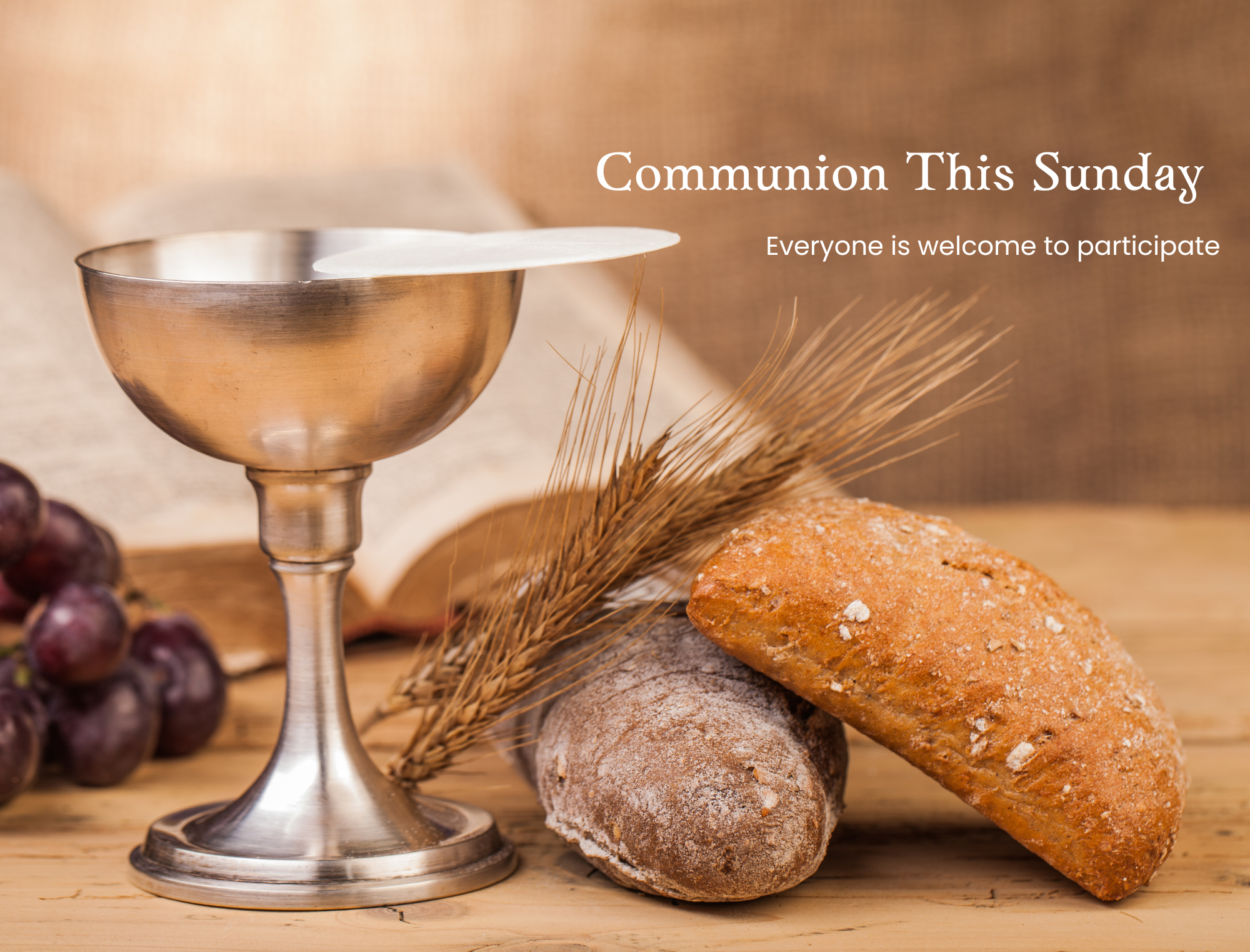 St. John's United Church | A chalice with a wafer, wheat stalks, two loaves of bread, and grapes sit on a table with an open book; text reads "Communion This Sunday, Everyone is welcome to participate.